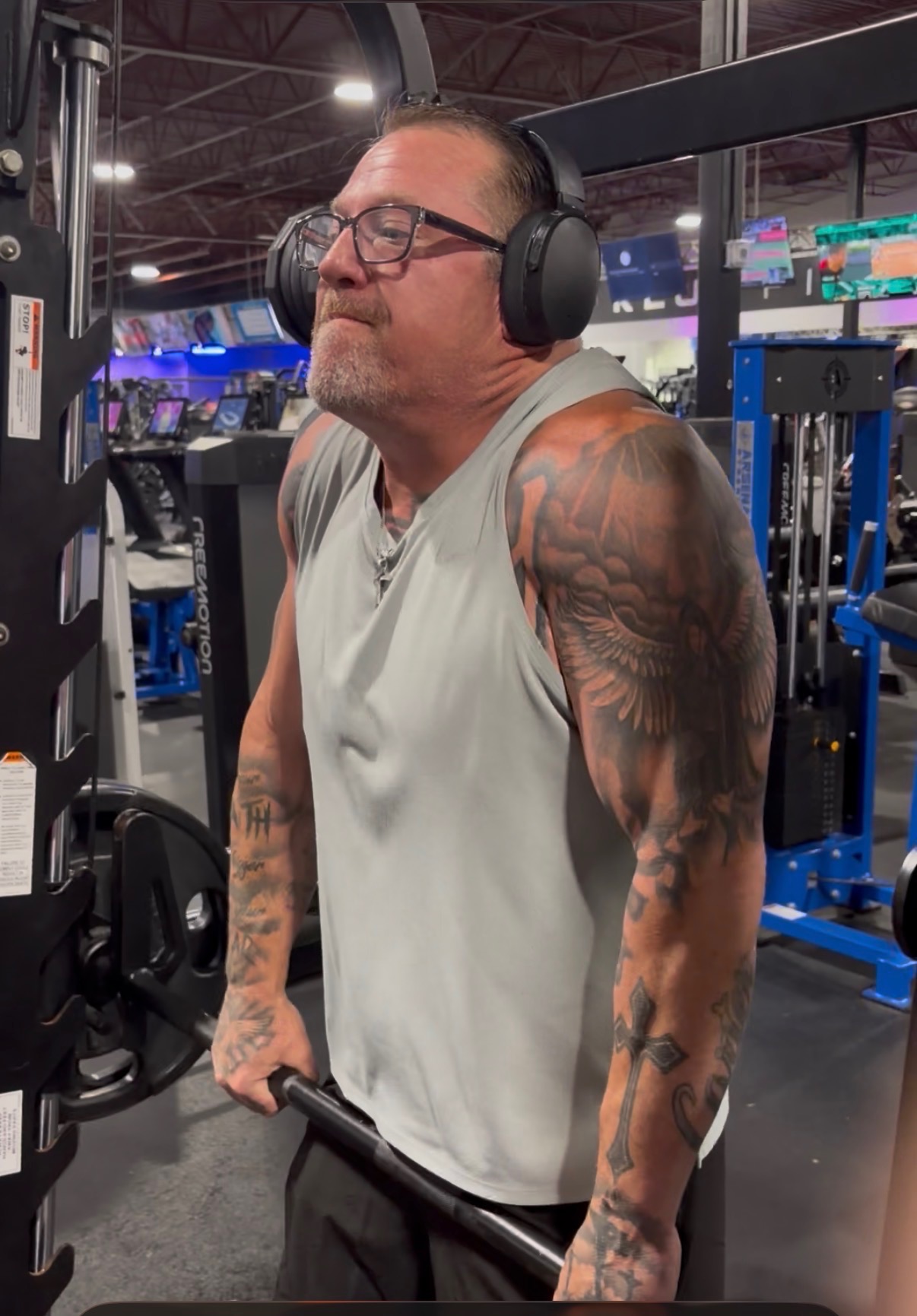 Coach Bruce working traps at the gym